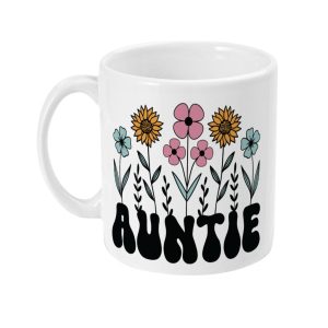 White ceramic mug with vibrant floral graphics and 'AUNTIE' in bold black letters at the bottom.