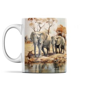 A serene scene of three elephants by a water body with trees in the background on a ceramic mug