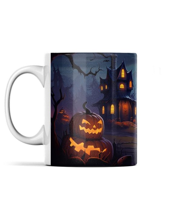 Spooky Halloween-themed mug featuring a glowing jack-o'-lantern, haunted house, and bats under a dark sky