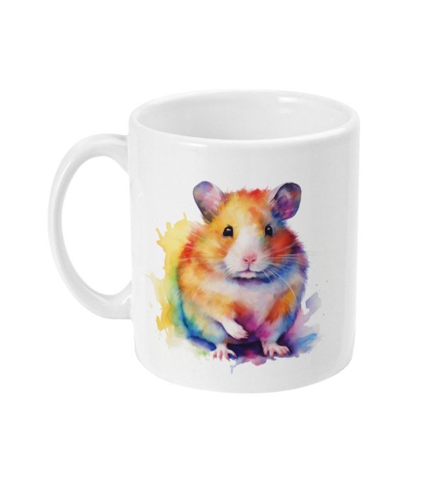 White ceramic mug with colorful hamster illustration in watercolor splash of yellow, blue, and pink