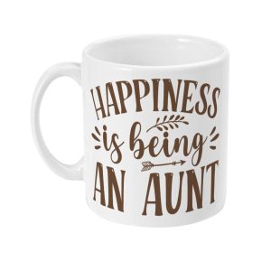 White ceramic mug with earthy brown 'HAPPINESS is being AN AUNT' text, adorned with decorative leaves and arrows.
