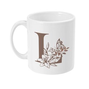 White ceramic mug with brown initial letter L surrounded by artistic floral and butterfly design in shades of brown.