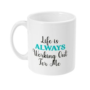 White ceramic mug with 'Life is ALWAYS Working Out For Me' in black and teal typography.