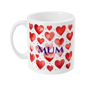 White ceramic mug with red heart pattern and 'MUM' in purple text, a perfect gift for a mother.