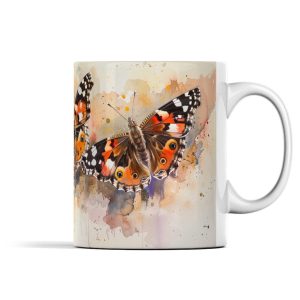 White ceramic mug with a vibrant watercolour butterfly design in orange and black hues.