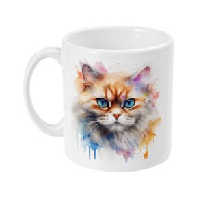 White ceramic mug featuring a vibrant watercolor-style Persian cat face with blue eyes and splashes of pink, blue, and orange.