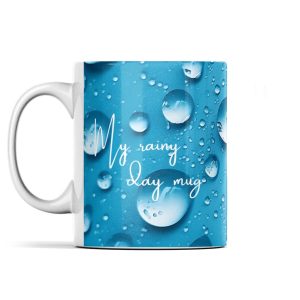 Ceramic mug with blue background and raindrop design, featuring 'My rainy day mug' text