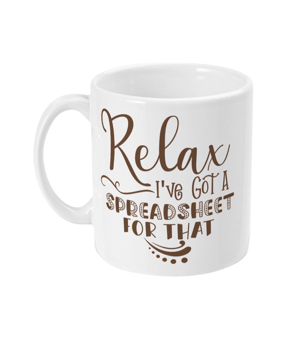 White ceramic mug with brown 'Relax I've Got A Spreadsheet For That' text and decorative swirls.