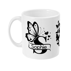 White mug with black butterfly design, small butterflies, hearts, and name 'Sophie' in a banner.