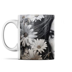 Monochrome ceramic mug featuring woman's face obscured by daisies against dark background.