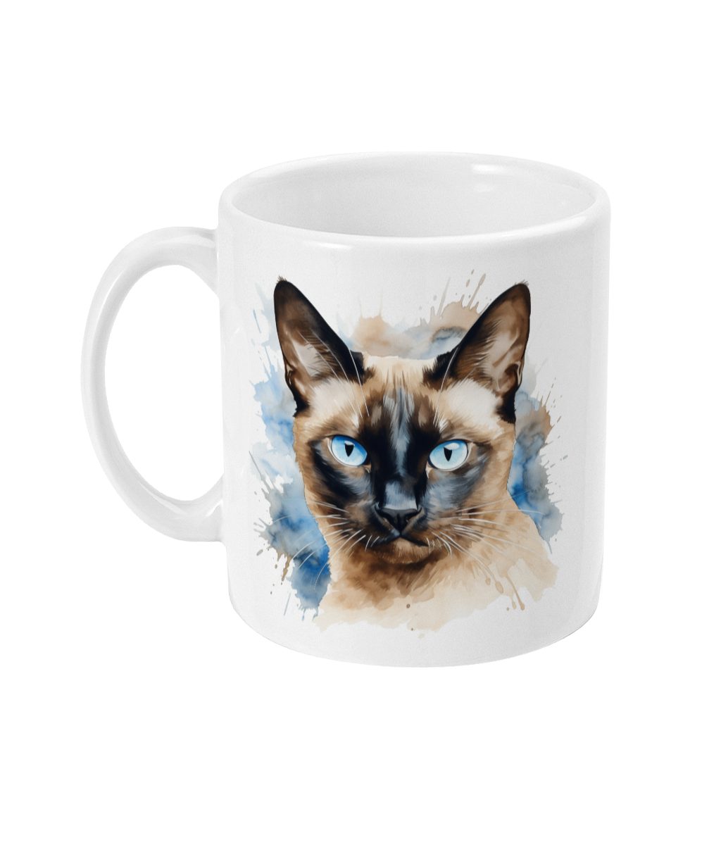 White ceramic mug featuring a lifelike Siamese cat with blue eyes and pointed ears on a blue and brown background