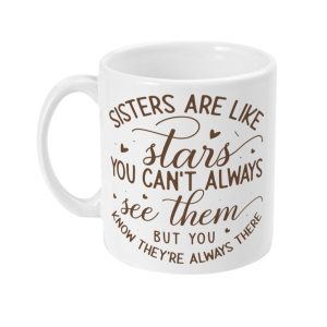 White mug with 'Sisters are like stars you can't always see them but you know they're always there' in decorative, brown script.