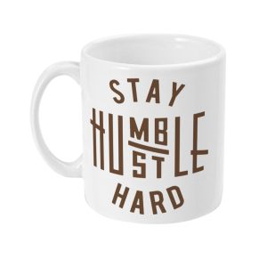 White ceramic mug with brown text: STAY HUMBLE HUSTLE HARD