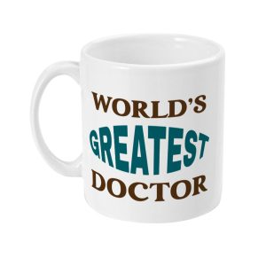 White ceramic mug with bold multicolored text: WORLD'S GREATEST DOCTOR