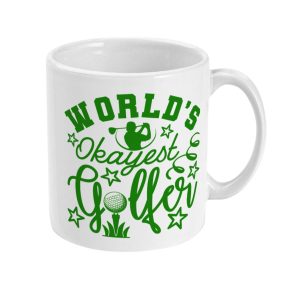 White ceramic mug with bold green text 'WORLD'S Okayest Golfer' and golf-themed graphics.