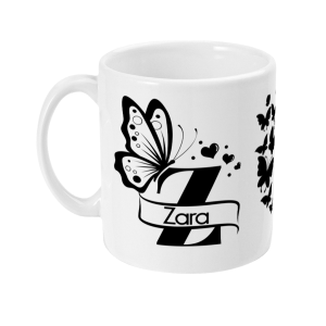 White ceramic mug with black butterfly and heart graphics, featuring the name Zara in a stylish monochromatic design.