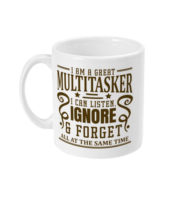 White ceramic mug with ornate brown text 'I AM A GREAT MULTITASKER I CAN LISTEN, IGNORE & FORGET ALL AT THE SAME TIME'