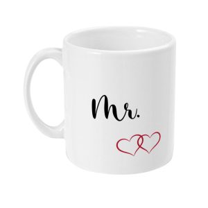 White ceramic mug with 'Mr.' in cursive black lettering and interlocked red hearts