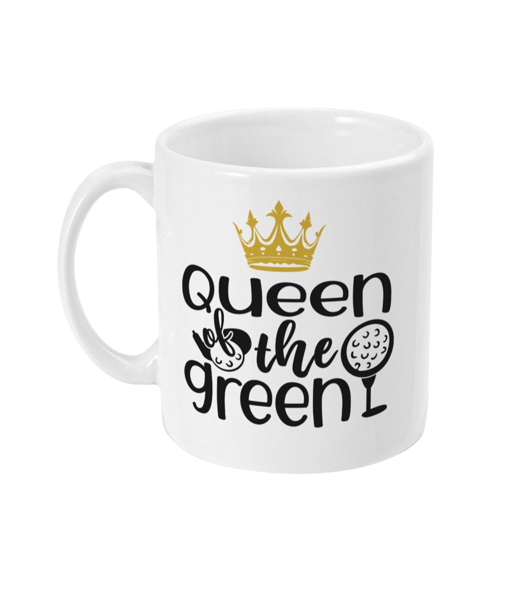 White ceramic mug with bold 'Queen of the Green' text, golden crown, and crossed golf clubs.