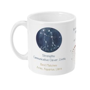 White ceramic mug with Gemini zodiac sign constellation graphic and astrological details in blue, brown, and white.