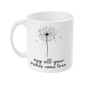 White ceramic mug featuring a black dandelion graphic with scattered seeds and the phrase 'may all your wishes come true'.